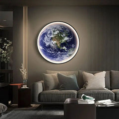 Planet Earth wall light above a sofa in a softly lit living room