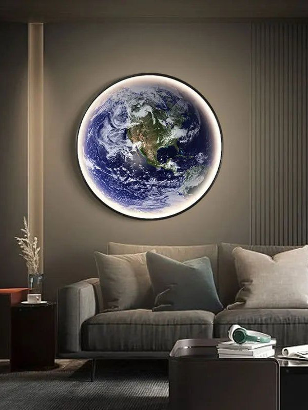 Planet Earth wall light above a sofa in a softly lit living room