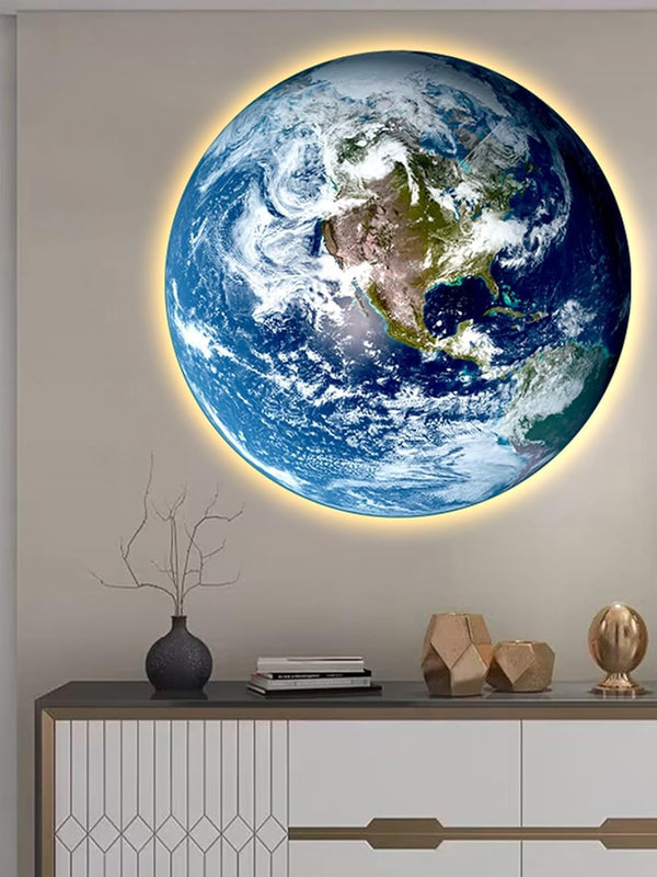 Planet Earth LED wall light glowing above a console table in a living room