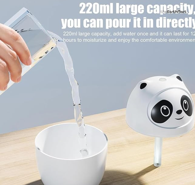 Filling the 220 ml panda humidifier tank from a cup