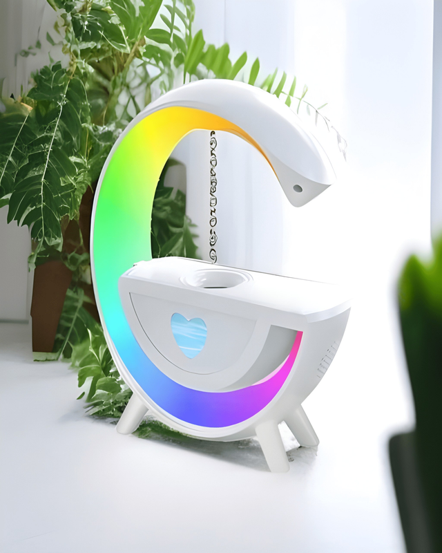 G-shaped anti-gravity humidifier glowing in rainbow colours