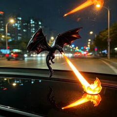 Dragon LED lamp lit up at night with city lights in the background